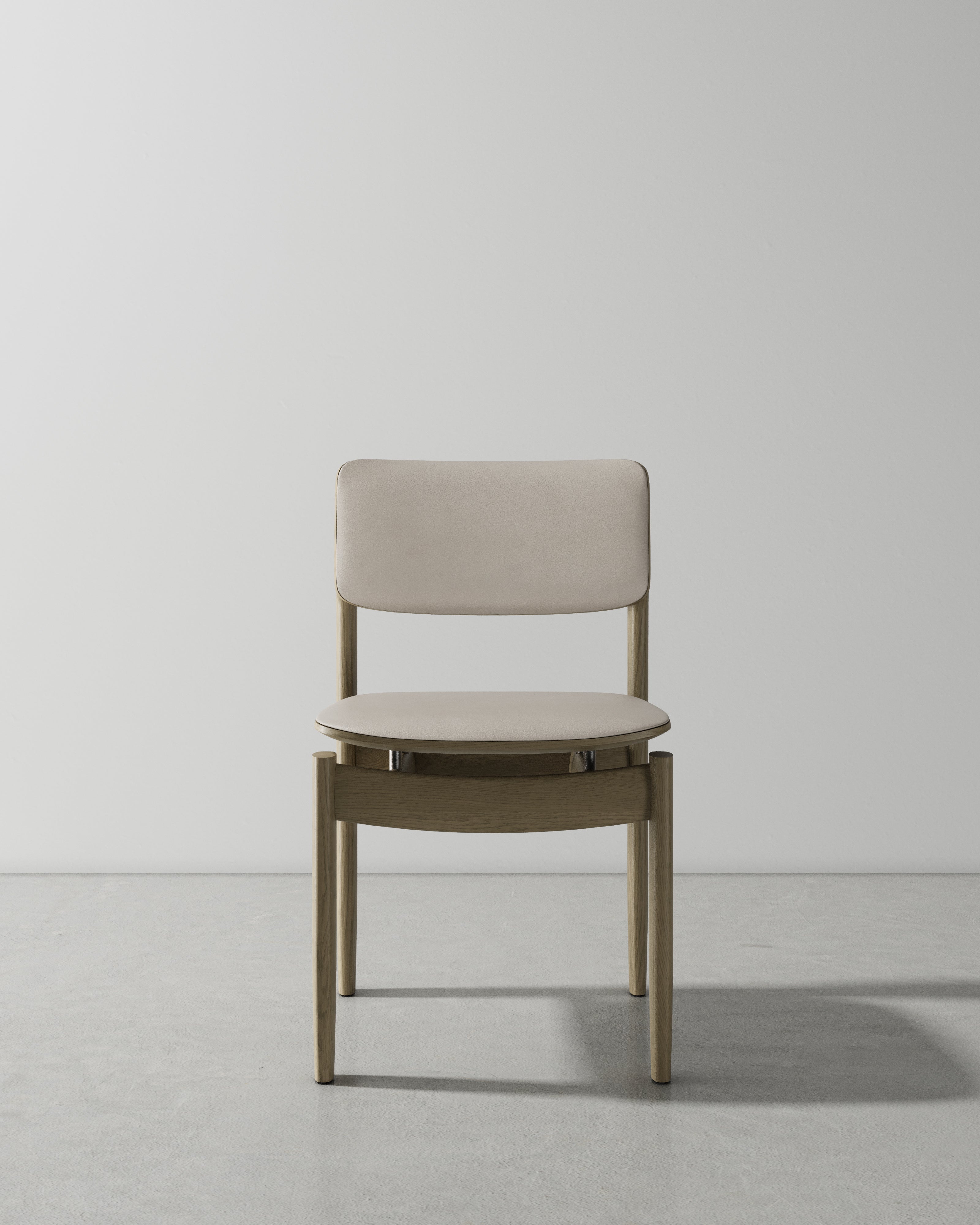 BOW UPHOLSTERED BACK DINING CHAIR