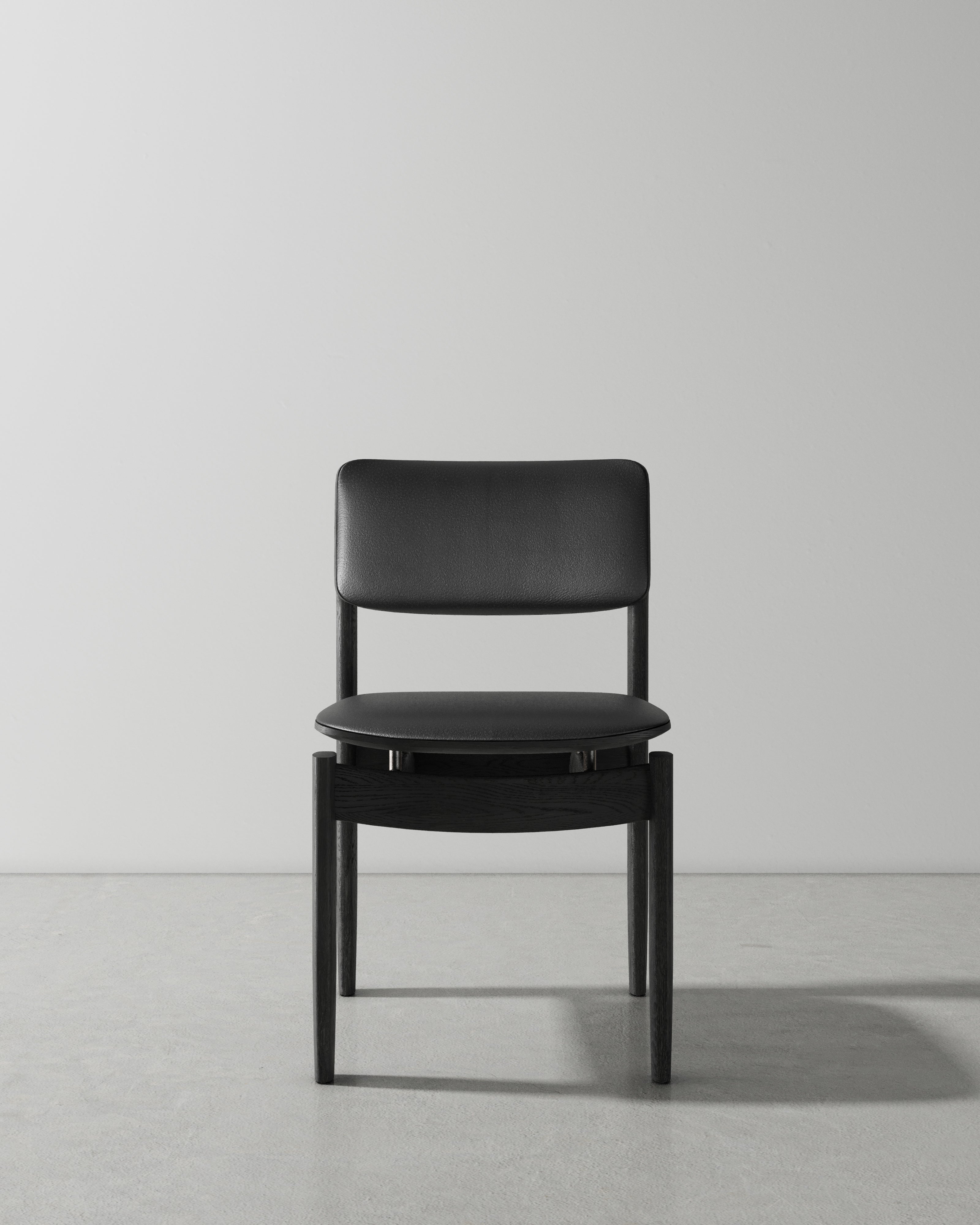 BOW UPHOLSTERED BACK DINING CHAIR