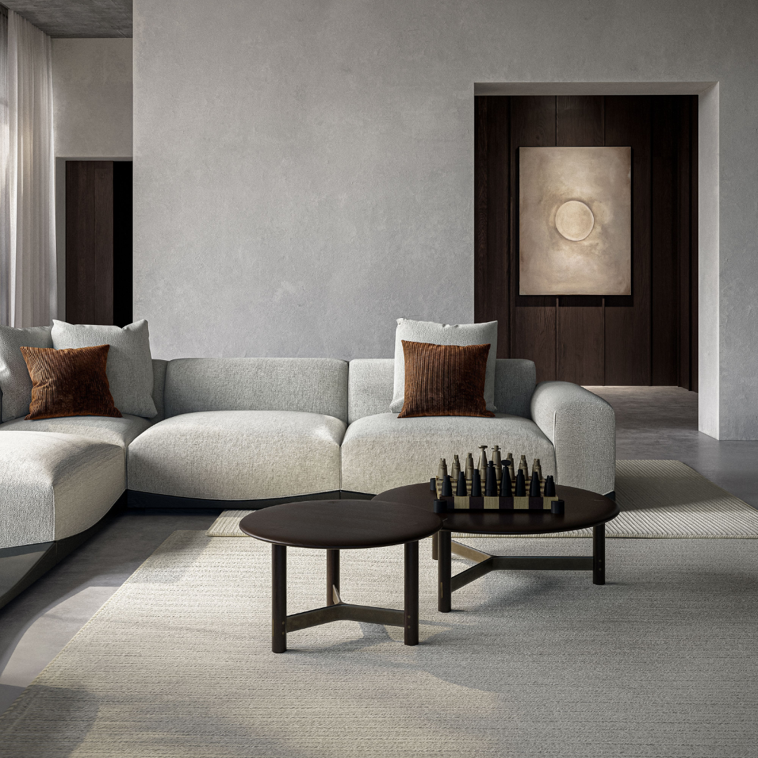 Modern living room with a gray sectional sofa, coffee table, and decorative elements.

 #Timber Finishing_Smoked Oak