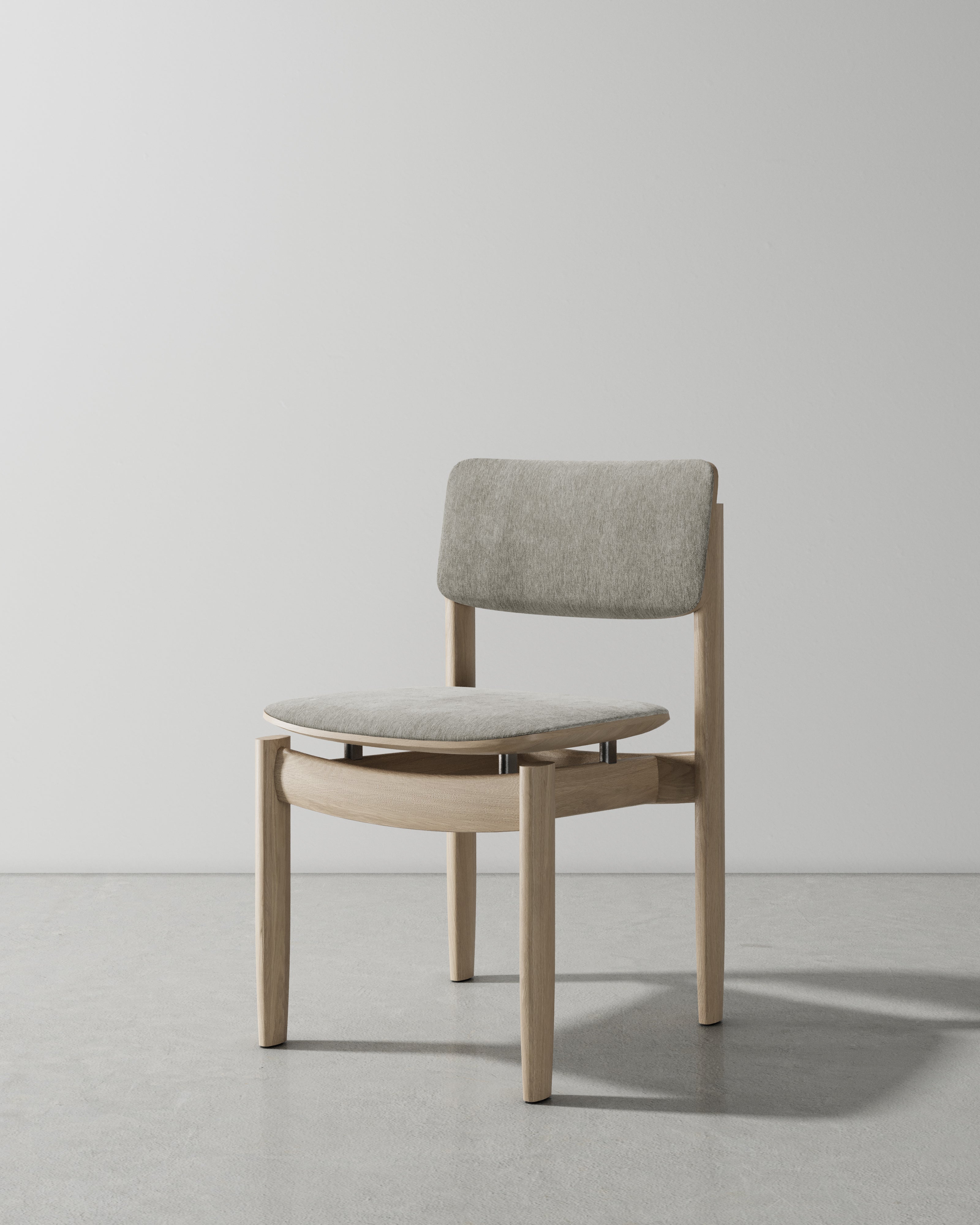 BOW UPHOLSTERED BACK DINING CHAIR