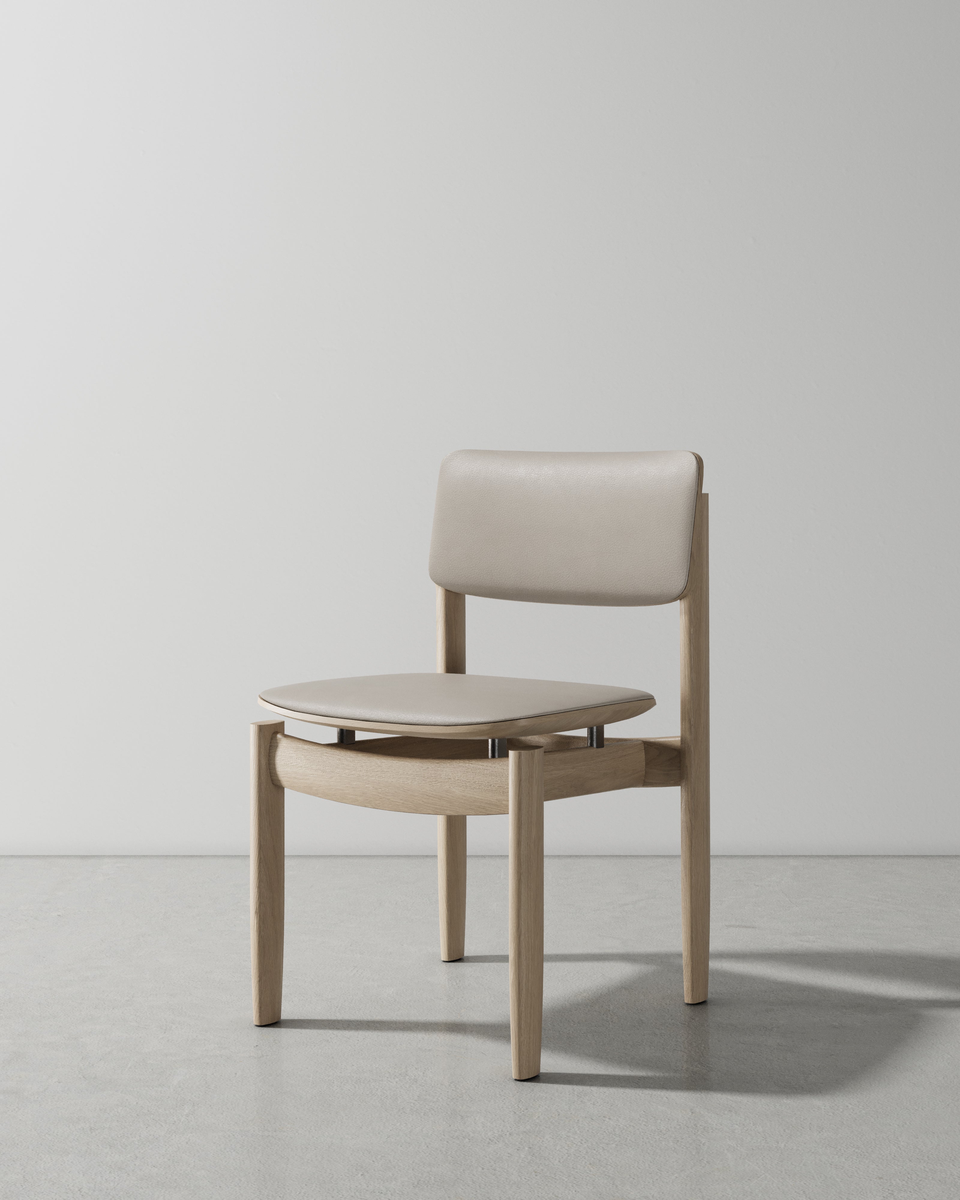 BOW UPHOLSTERED BACK DINING CHAIR