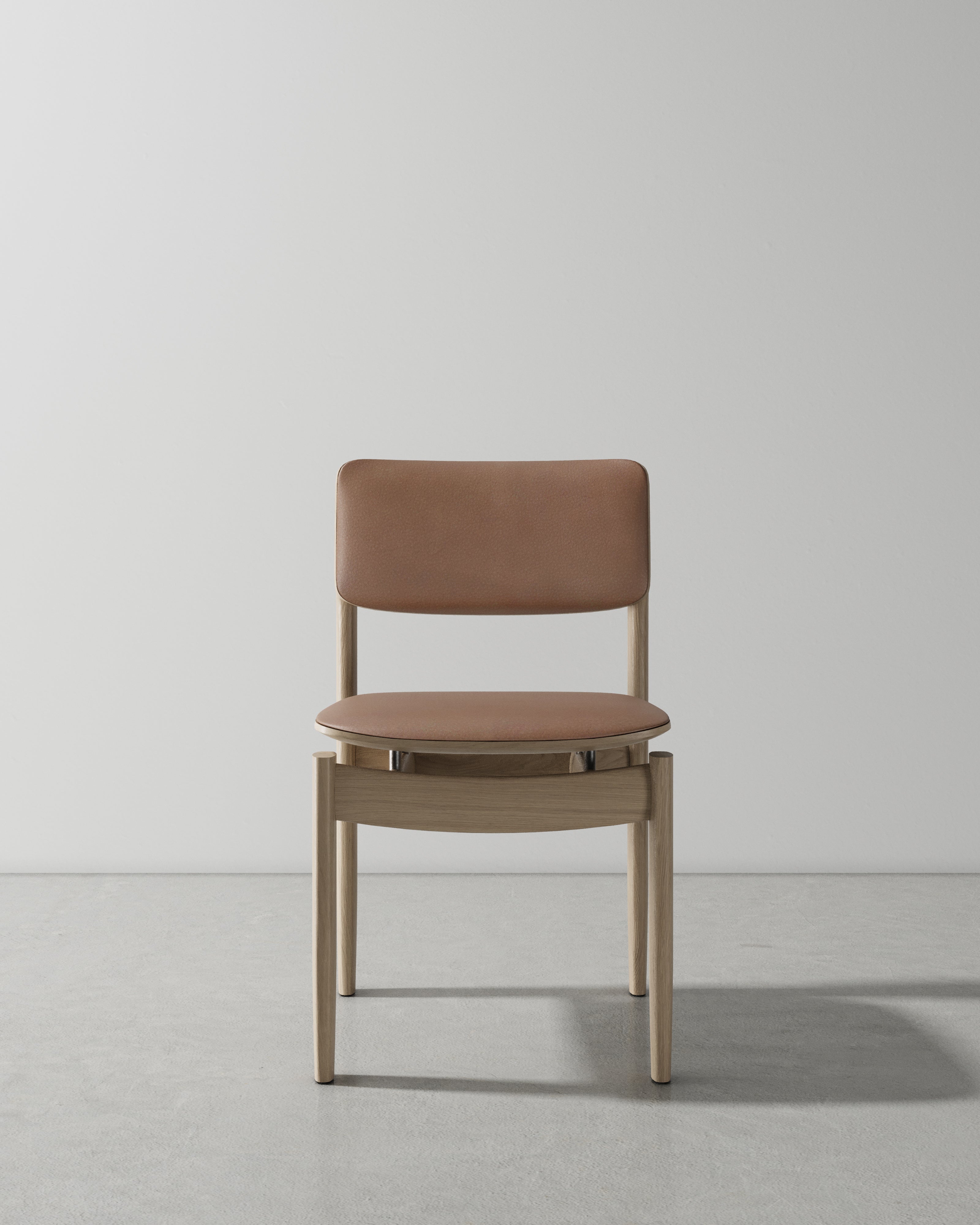 BOW UPHOLSTERED BACK DINING CHAIR