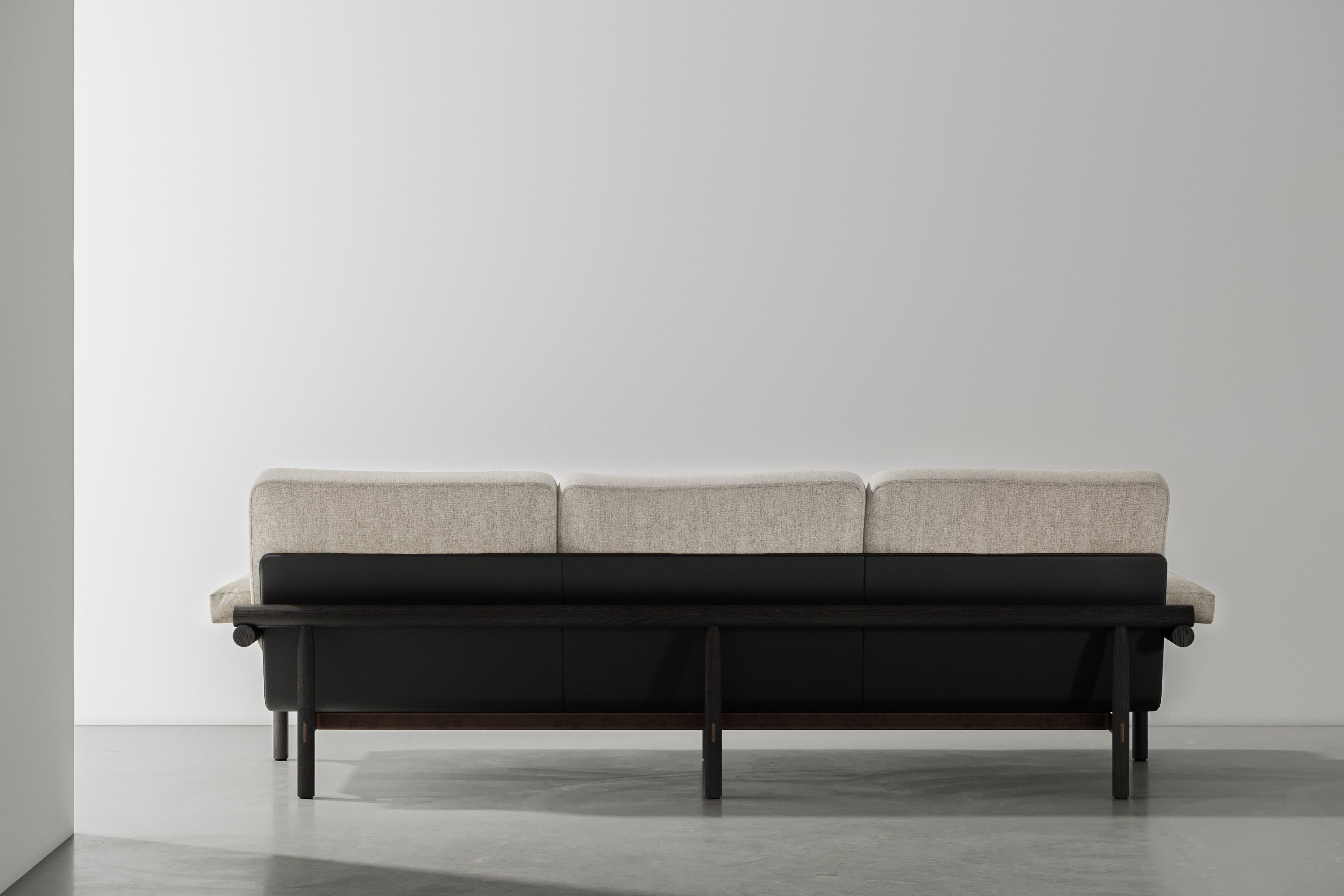 STILT 3-SEATER SOFA WITH ARMS